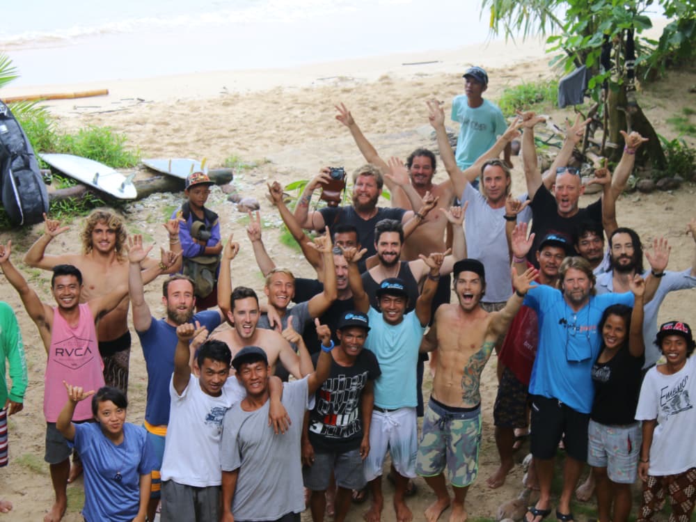 A coaching group on the beach after a session